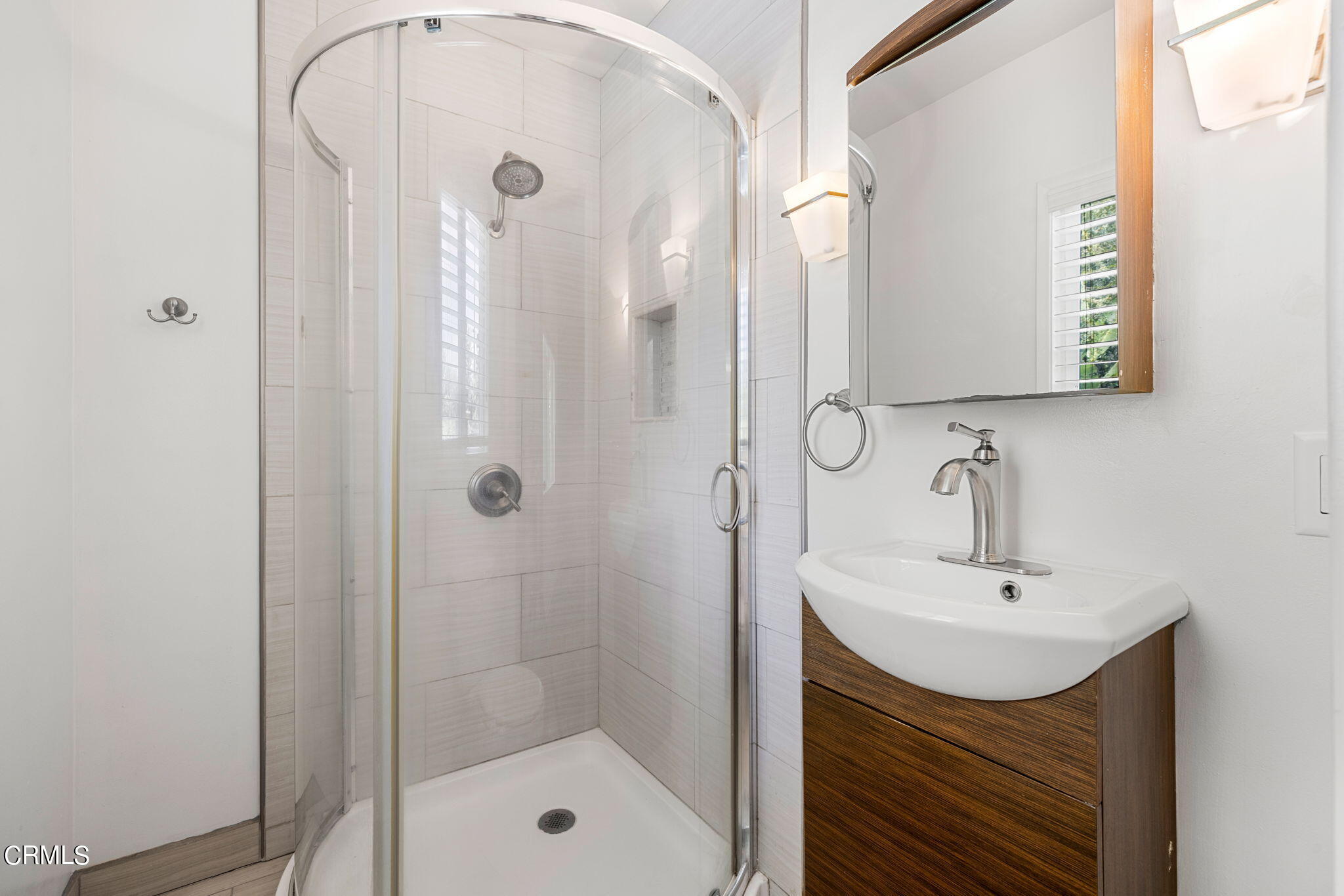 3127 Thurin Avenue Altadena, CA 91001 - Photo 16 of 23 a bathroom with a shower a sink and mirror