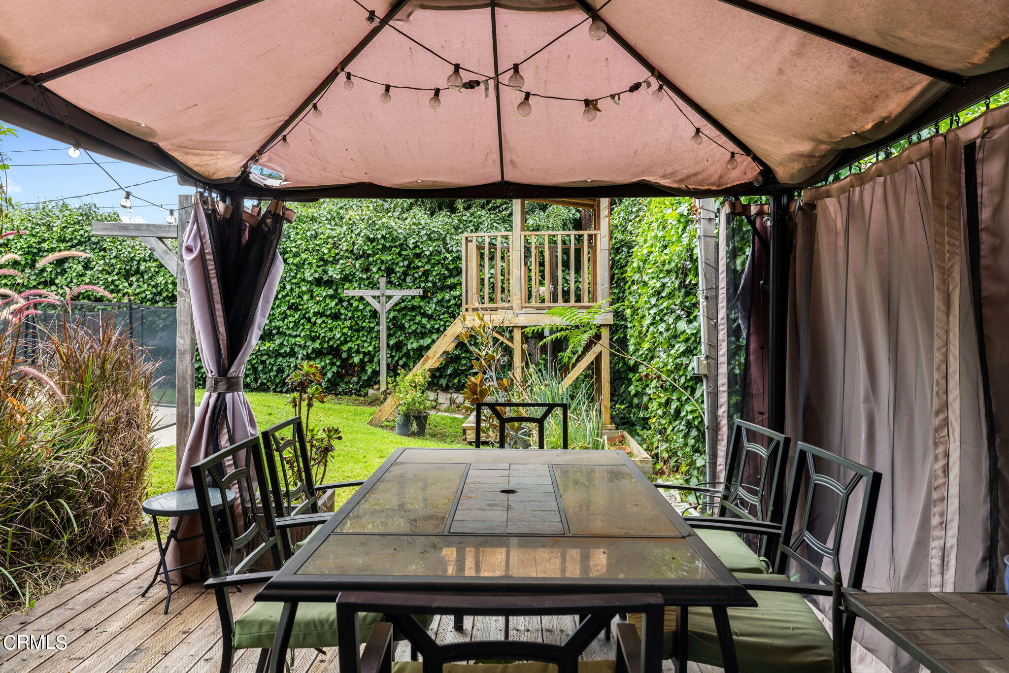 3127 Thurin Avenue Altadena, CA 91001 - Photo 19 of 23 a view of outdoor dining space with a patio and a yard