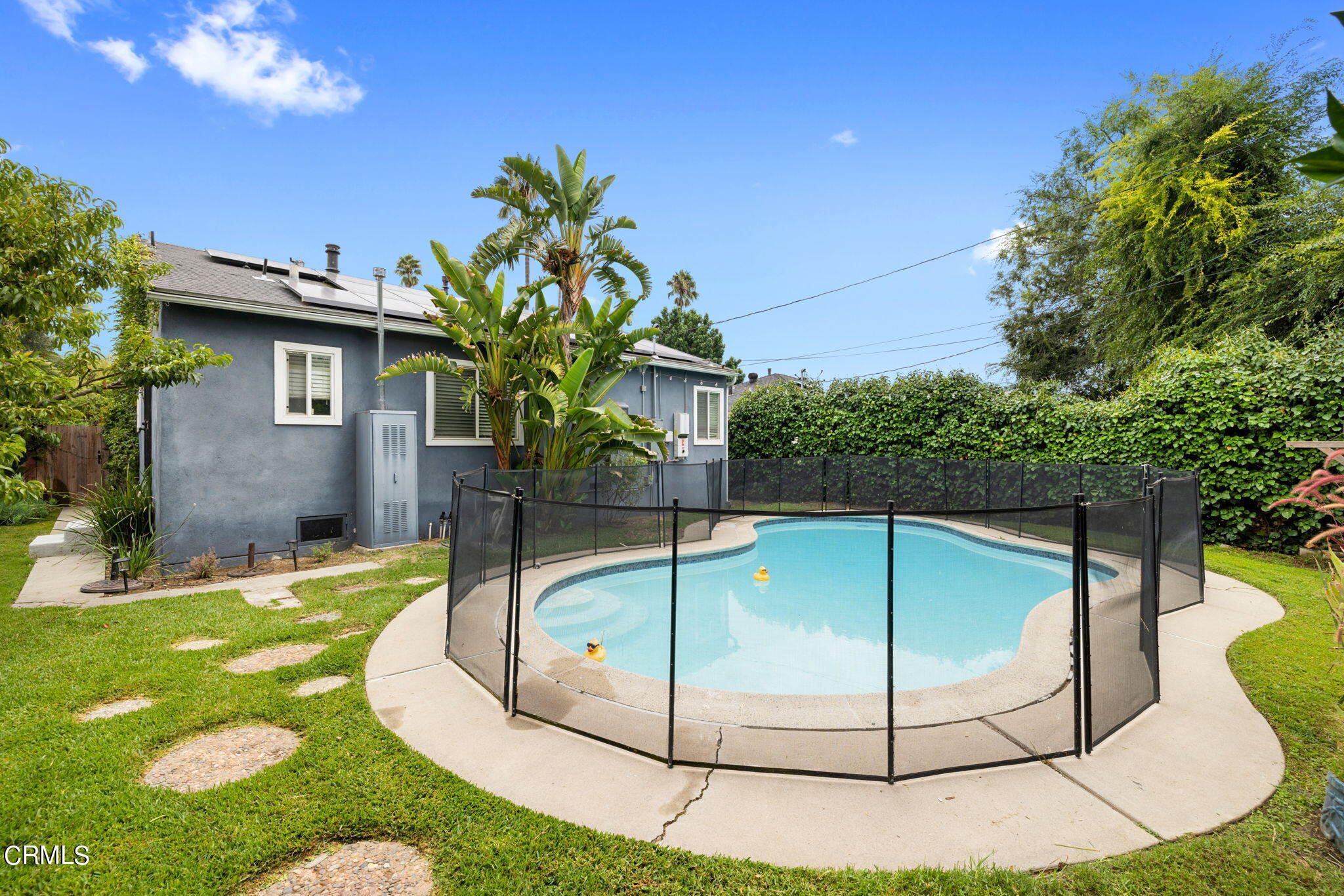 3127 Thurin Avenue Altadena, CA 91001 - Photo 22 of 23 a swimming pool with lots of tress in glass door