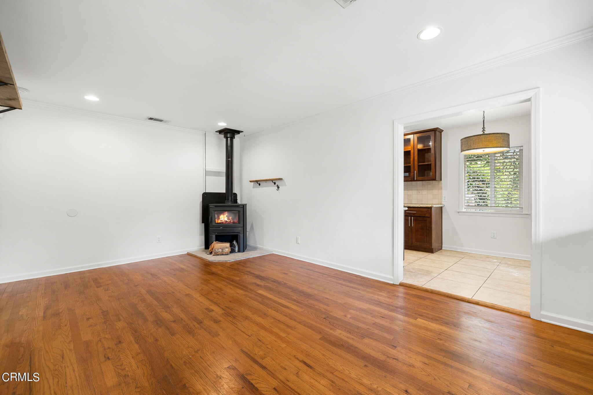 3127 Thurin Avenue Altadena, CA 91001 - Photo 5 of 23 a view of a room with wooden floor kitchen view and a window
