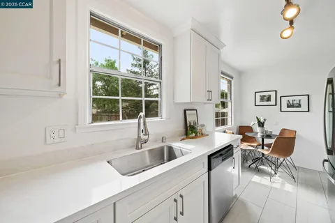 a kitchen with a sink and a window