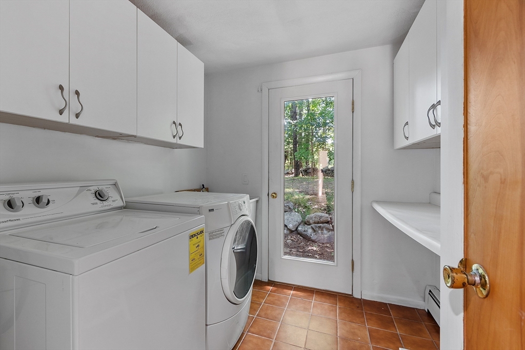 56 Old Littleton Road Harvard, MA 01451 - Photo 15 of 26 a utility room with dryer and washer