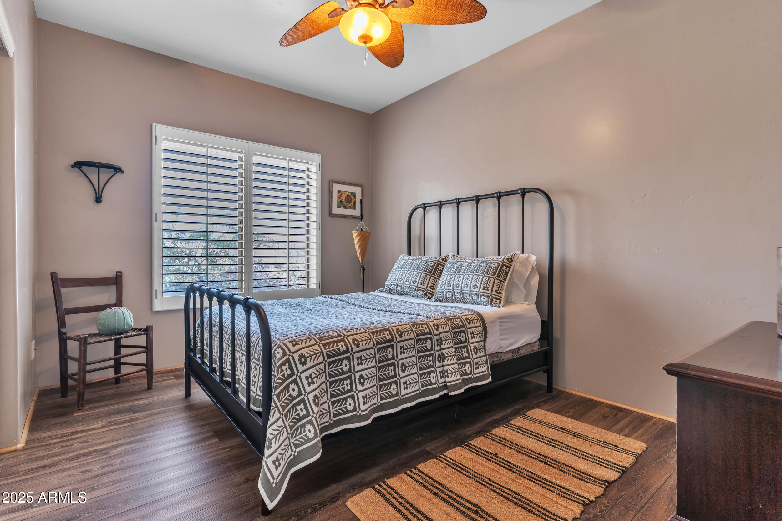 613 South Val Vista Road Apache Junction, AZ 85119 - Photo 18 of 31 a bed sitting in a bedroom next to a window