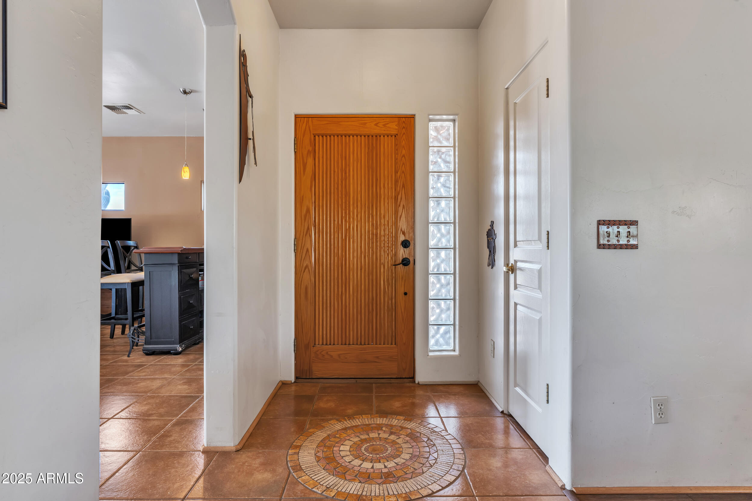 613 South Val Vista Road Apache Junction, AZ 85119 - Photo 25 of 31 a view of a hallway with a livingroom and a bedroom