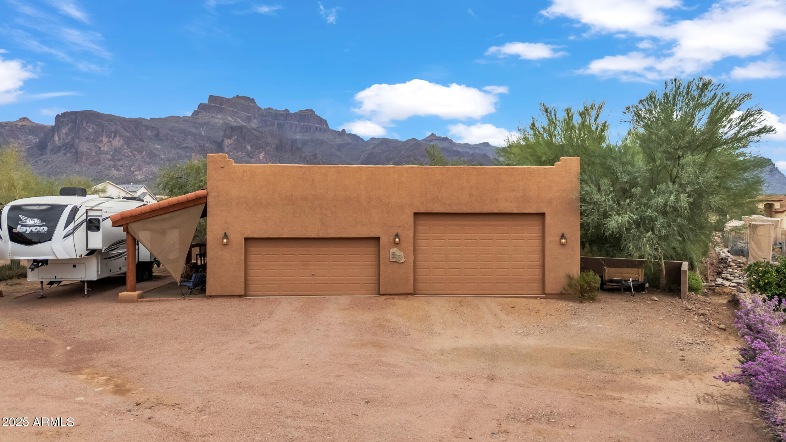 613 South Val Vista Road Apache Junction, AZ 85119 - Photo 5 of 31 a view of a car in front of a house