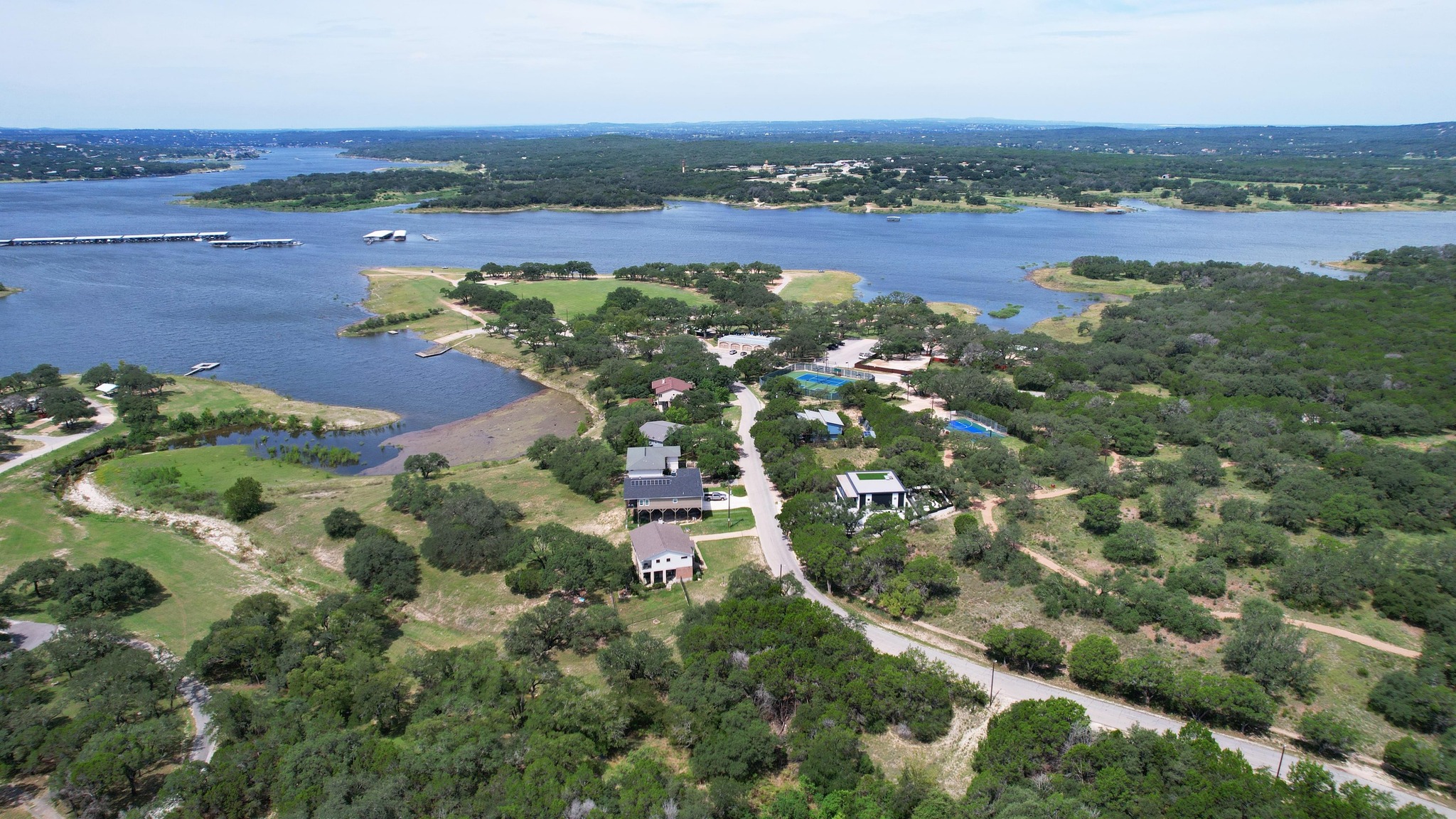 6719 Bar K Ranch Road Lago Vista, TX 78645 - Photo 17 of 36 an aerial view of a houses with outdoor space