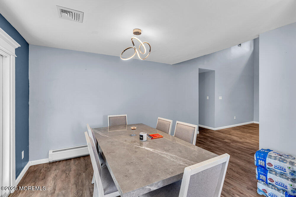 41 Sweetbriar Trail Howell, NJ 07731 - Photo 4 of 11 a workspace with furniture and wooden floor