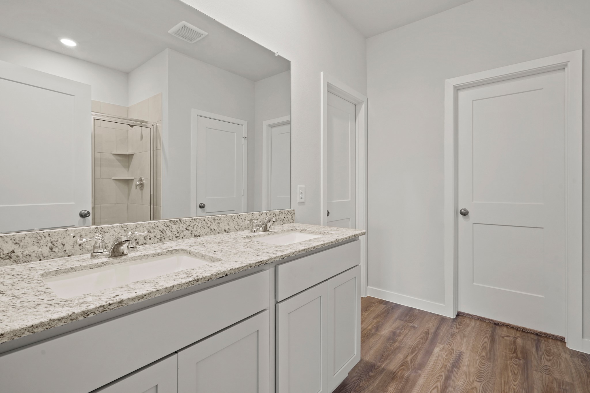 536 Shoreview Drive Conroe, TX 77303 - Photo 13 of 27 a bathroom with a granite countertop sink and a mirror