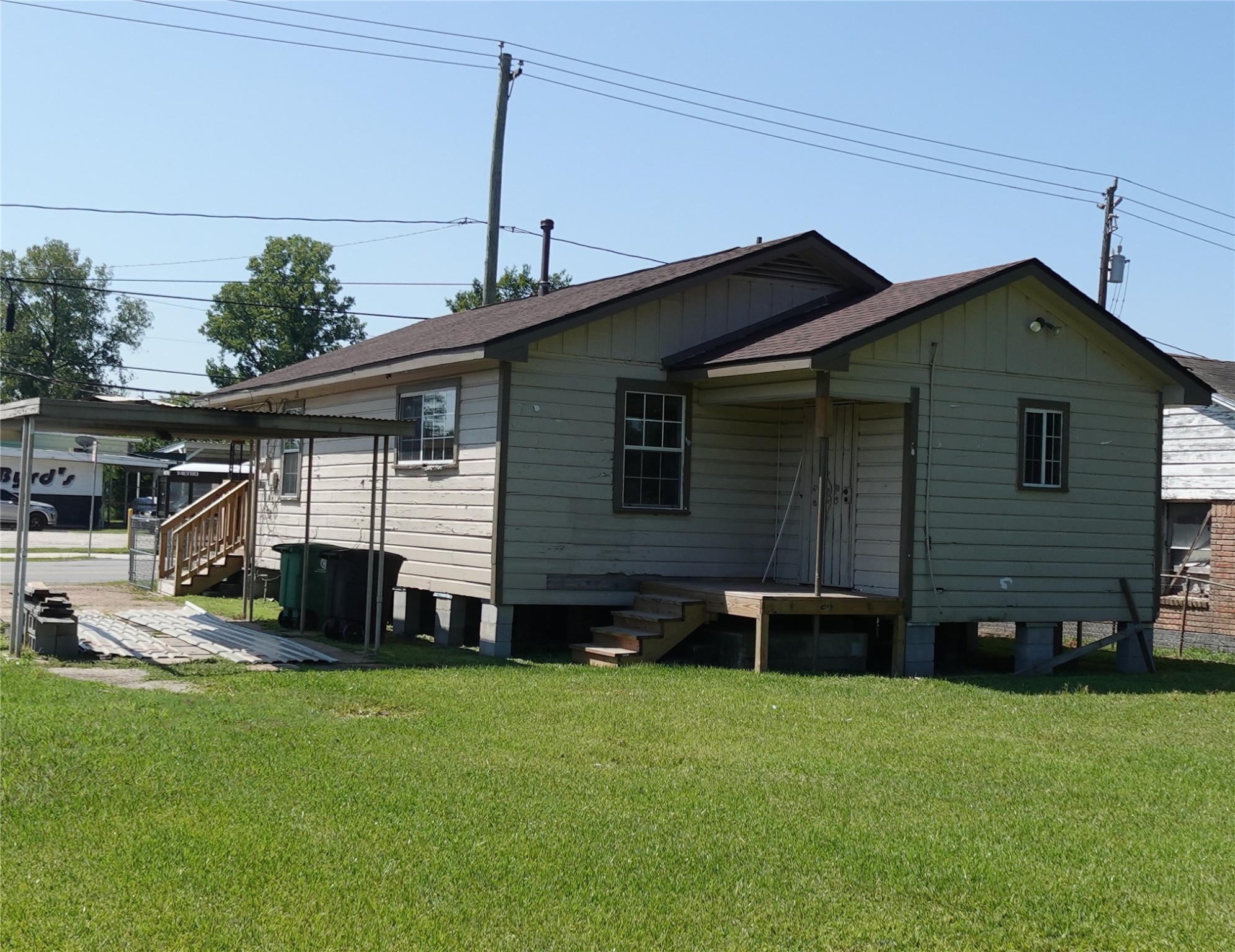 4825 Weaver Road Houston, TX 77016 - Photo 2 of 8 Rear View. Covered Patio. Large Back Yard.