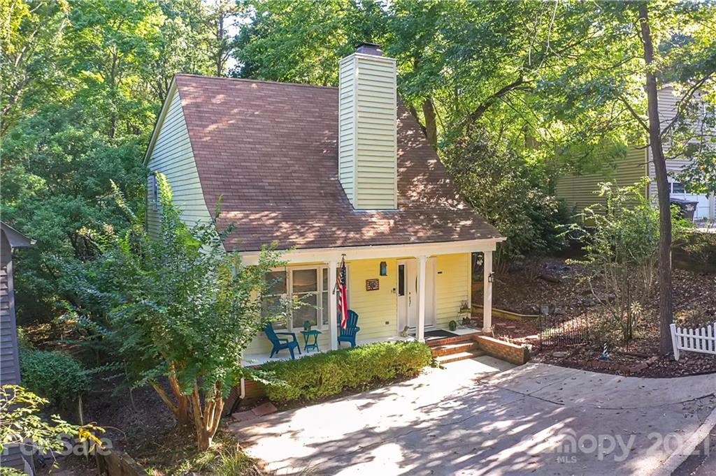 27036 Fahleh Cove Tega Cay, SC 29708 - Photo 1 of 21 a view of a house with a tree