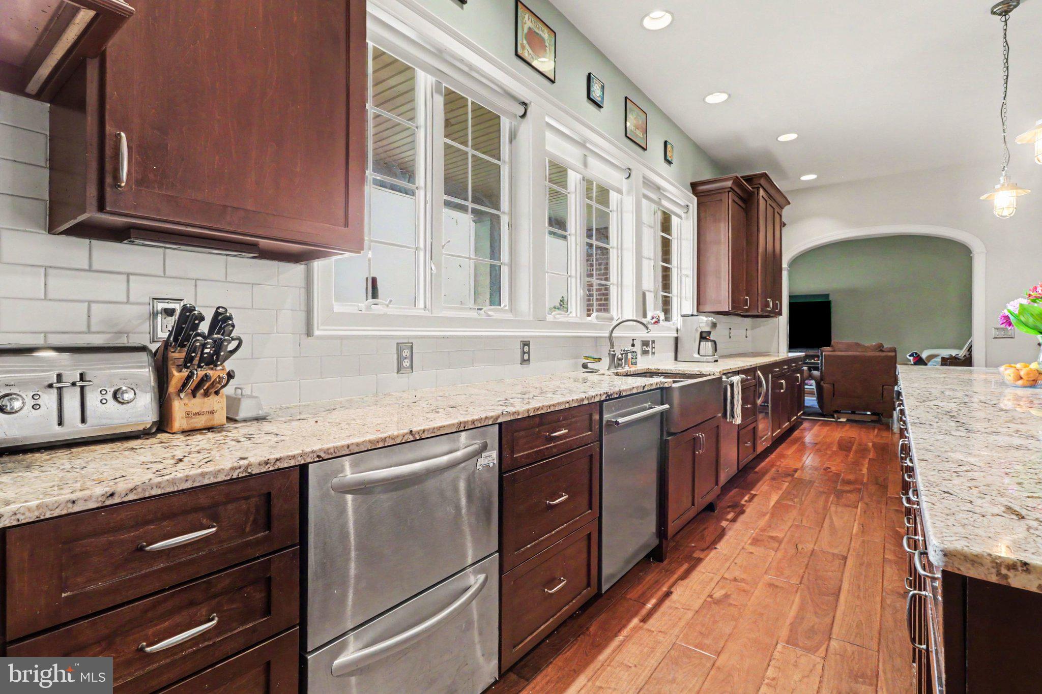 1080 Swatara Road Hershey, PA 17033 - Photo 7 of 59 a large kitchen with stainless steel appliances granite countertop a sink and cabinets