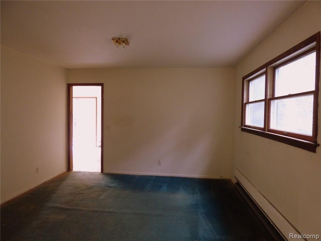 16333 Lowery Road Chelsea, MI 48118 - Photo 6 of 23 6 FORMAL DINING AREA OTHER DIRECTION.JPG