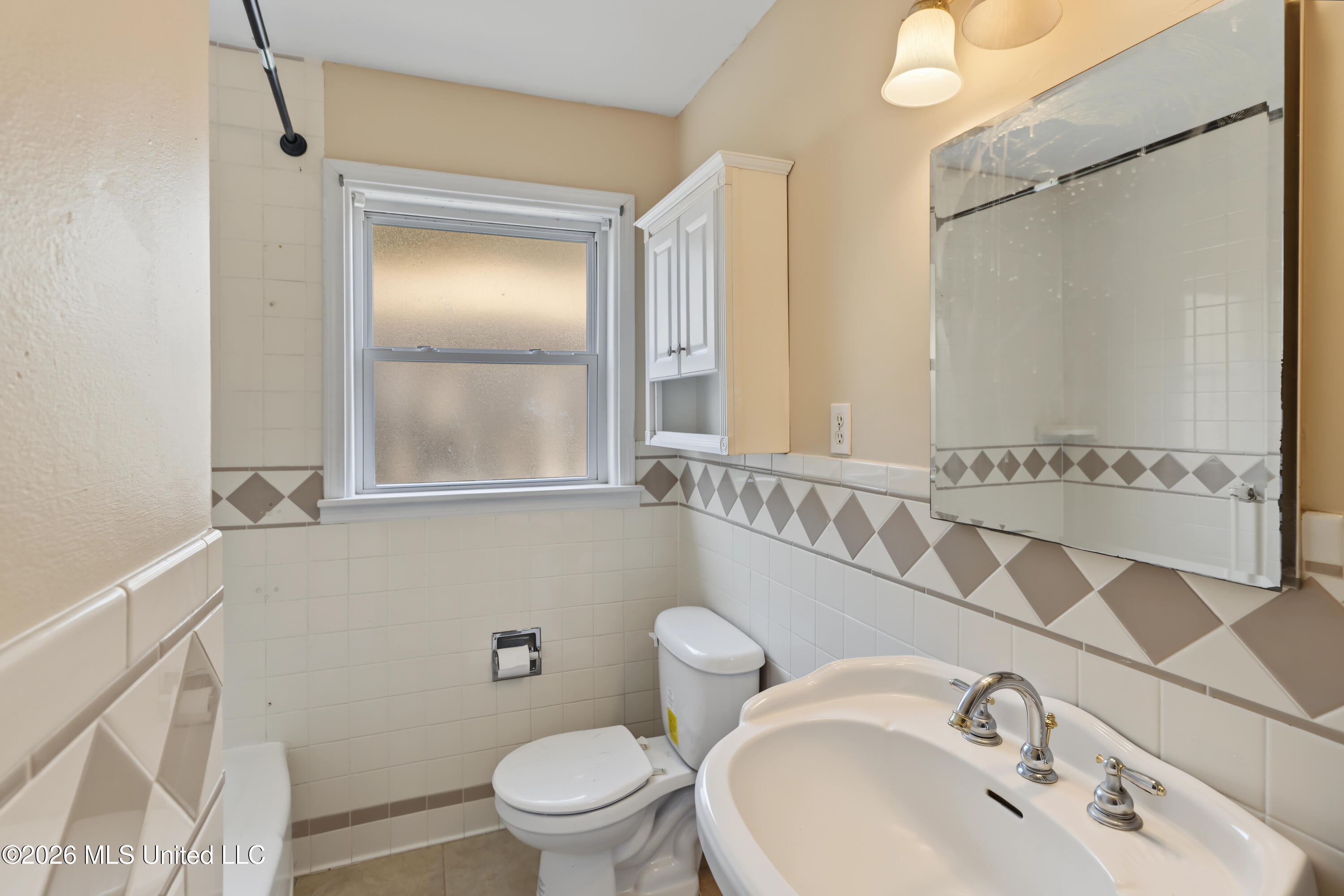 1713 State Street Biloxi, MS 39531 - Photo 10 of 16 Hall Bathroom