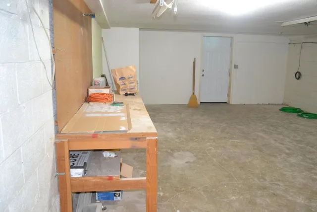 a view of a room with a large window