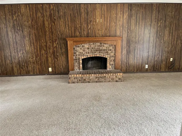 a living room with a fireplace