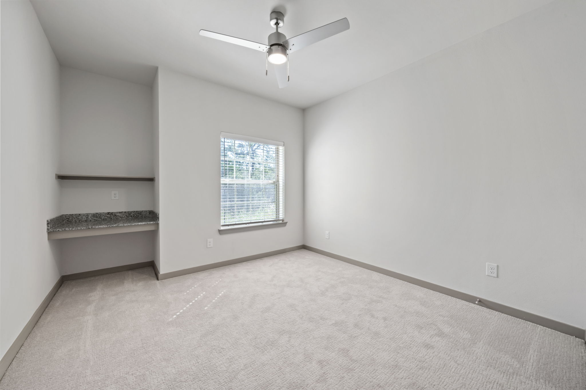 691 Union Chapel Road, Unit S1 Cedar Creek, TX 78612 - Photo 15 of 28 an empty room with windows and ceiling fan