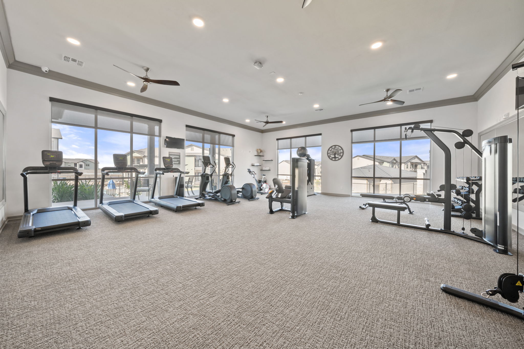 691 Union Chapel Road, Unit S1 Cedar Creek, TX 78612 - Photo 19 of 28 a view of a room with gym equipment and a large window