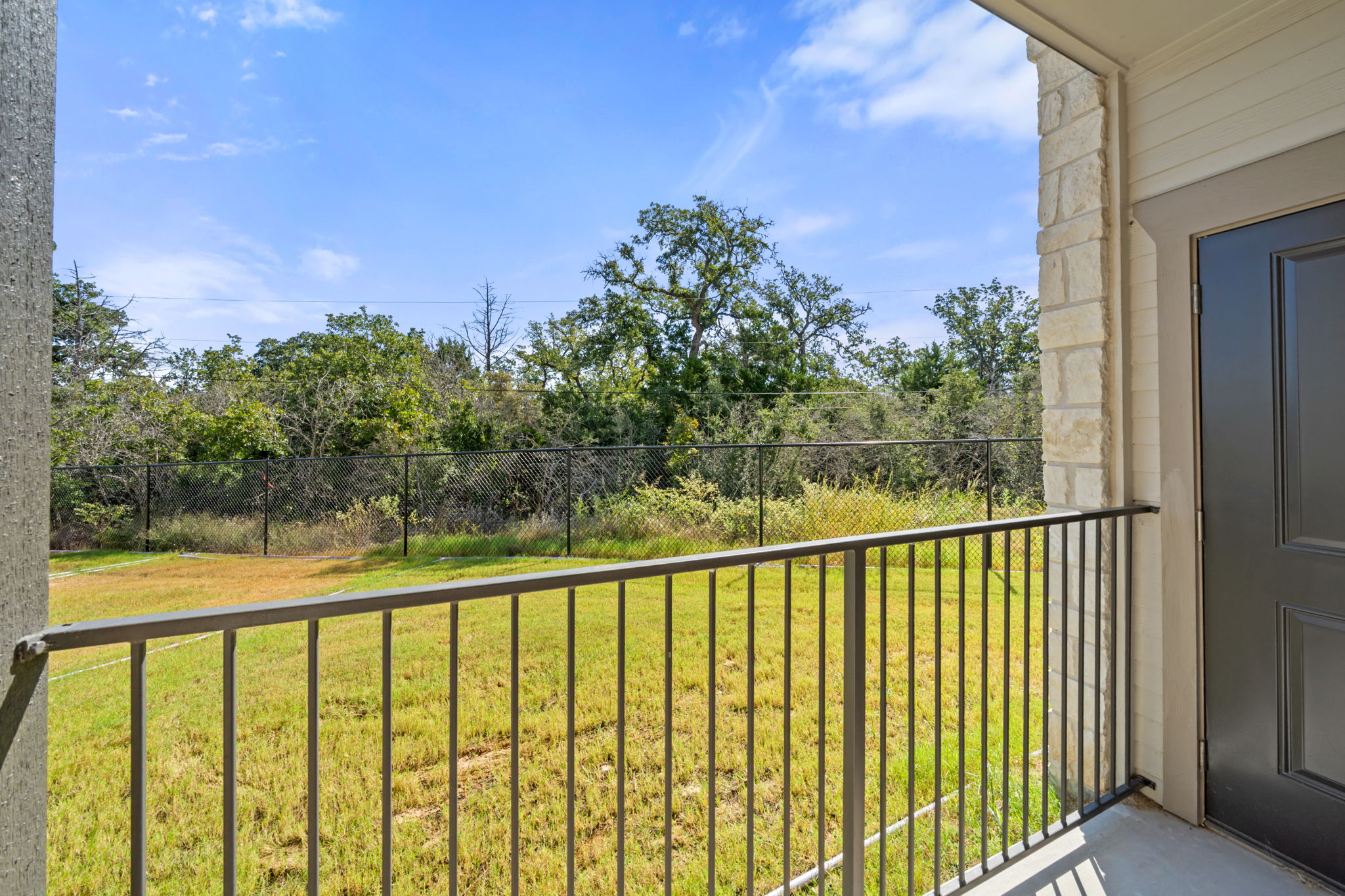 691 Union Chapel Road, Unit S1 Cedar Creek, TX 78612 - Photo 21 of 28 a view of a balcony with an outdoor space