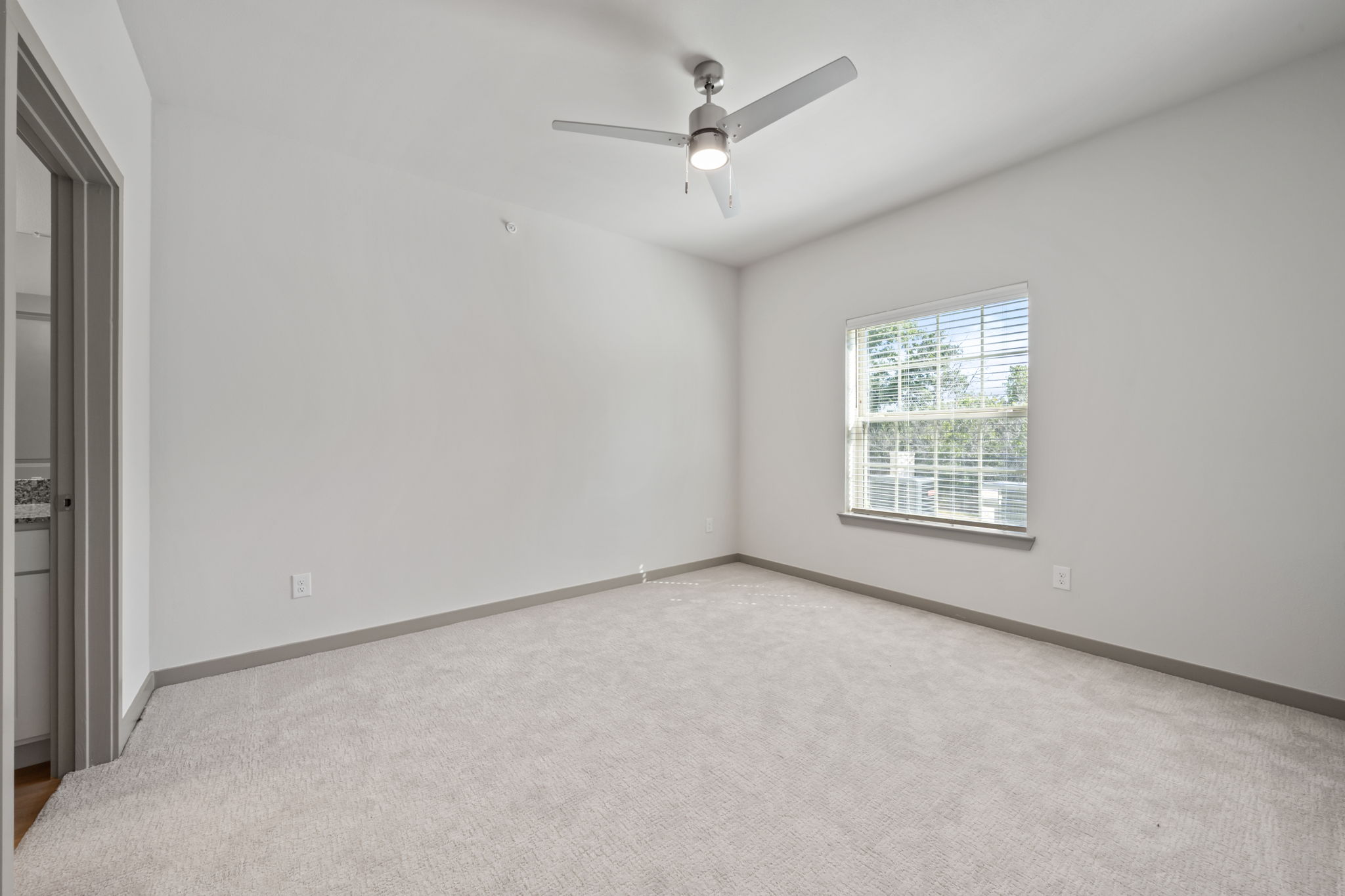 691 Union Chapel Road, Unit S1 Cedar Creek, TX 78612 - Photo 28 of 28 an empty room with a window and a fan