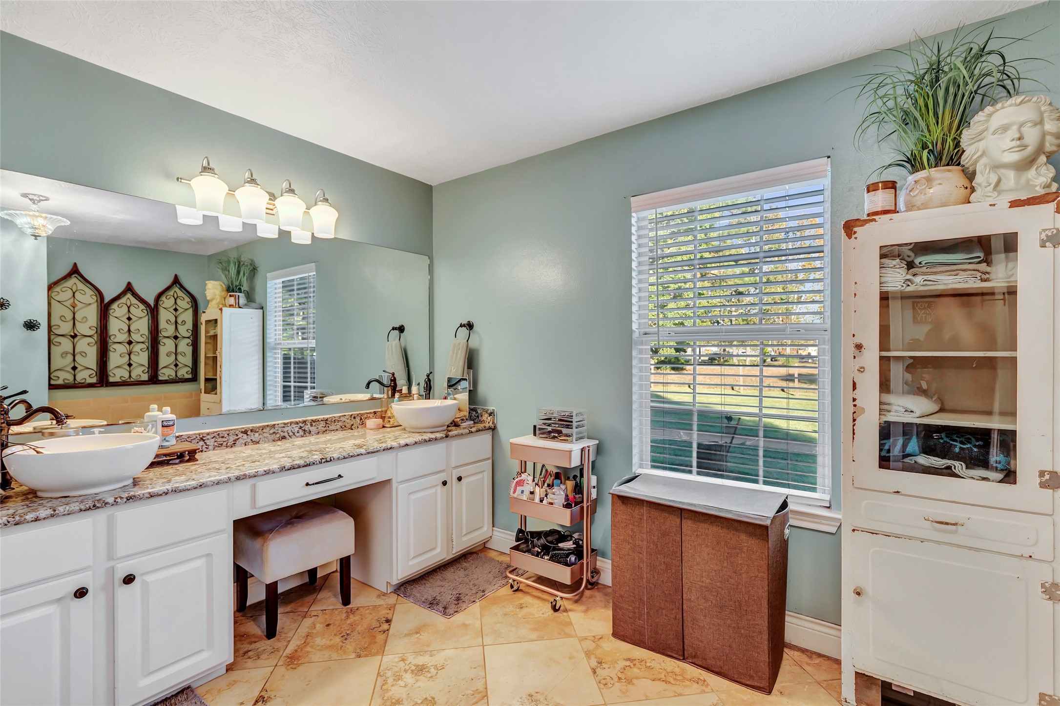 97 County Road 2268 Cleveland, TX 77327 - Photo 18 of 36 a room with a large window and mirror