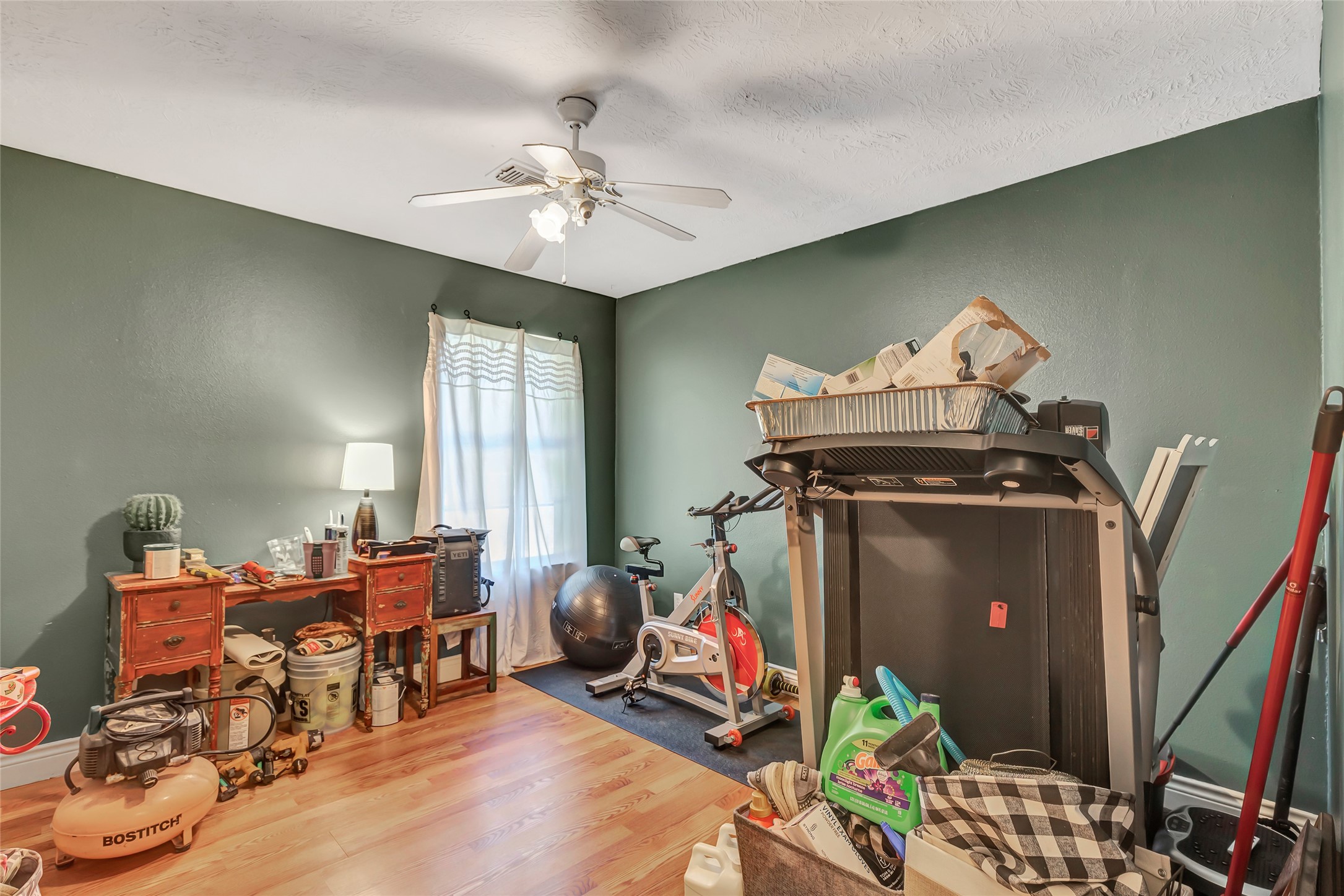 97 County Road 2268 Cleveland, TX 77327 - Photo 23 of 36 a view of a room with gym equipment