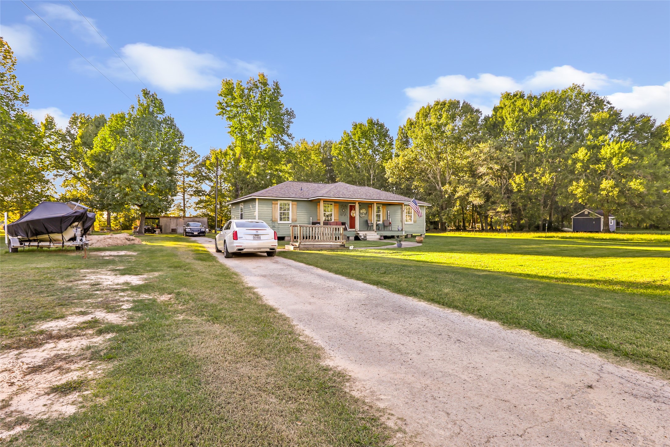 97 County Road 2268 Cleveland, TX 77327 - Photo 35 of 36 a view of outdoor space yard and swimming pool