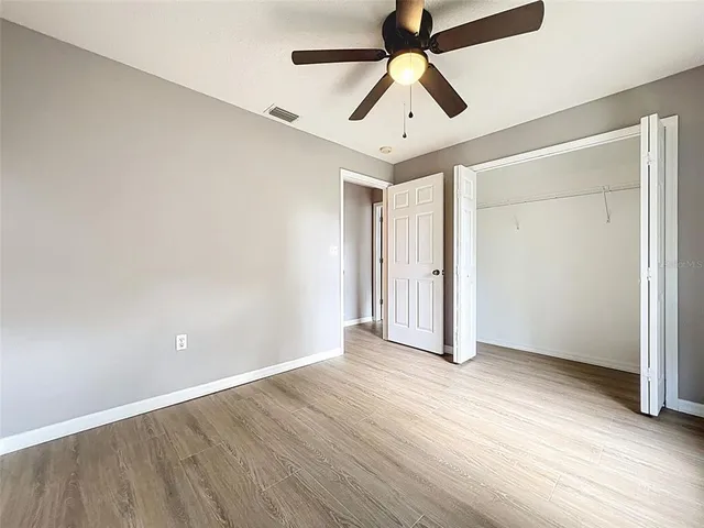 a front view of house with a garden