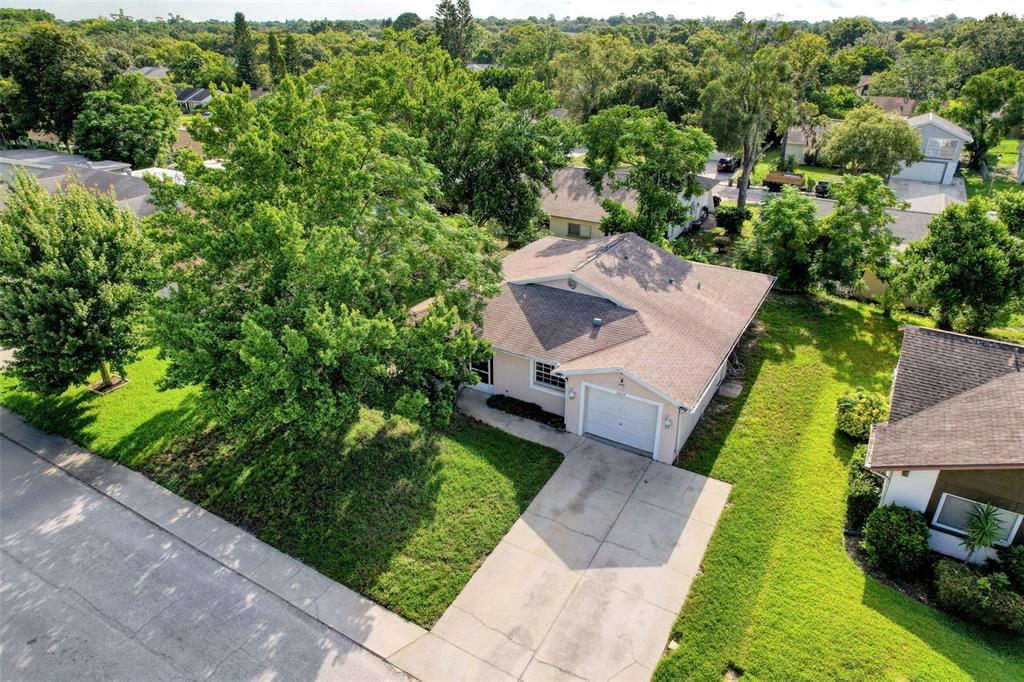 12214 Partridge Hill Row Hudson, FL 34667 - Photo 5 of 80 an aerial view of a house