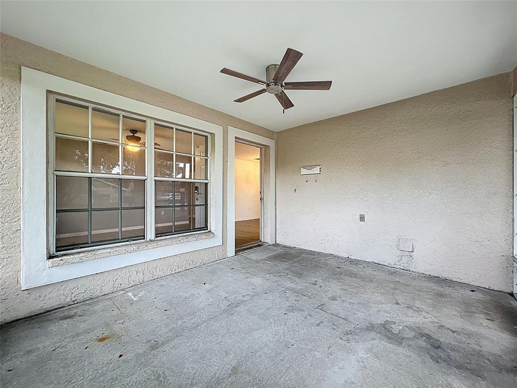 12214 Partridge Hill Row Hudson, FL 34667 - Photo 57 of 80 a view of an empty room with a window