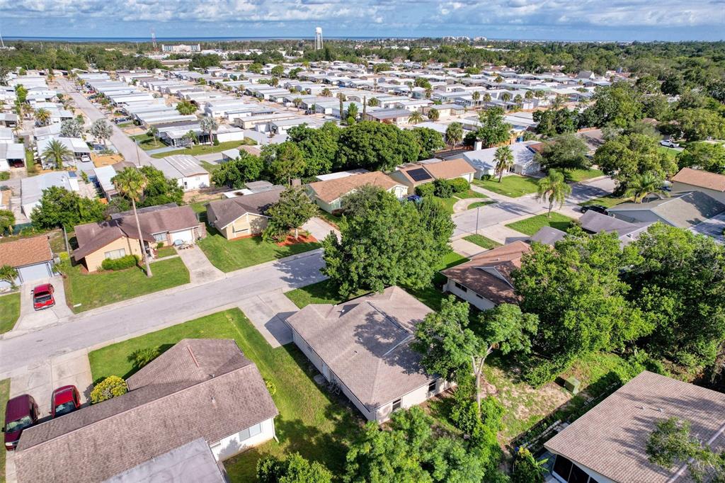 12214 Partridge Hill Row Hudson, FL 34667 - Photo 68 of 80 an aerial view of residential houses with outdoor space and street view