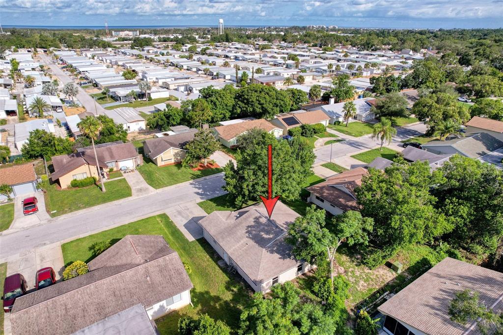 12214 Partridge Hill Row Hudson, FL 34667 - Photo 9 of 80 an aerial view of residential houses with outdoor space and street view