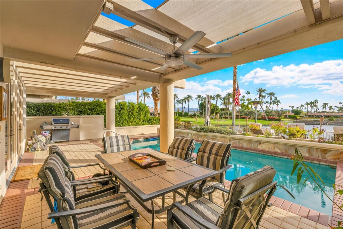 75467 Riviera Drive Indian Wells, CA 92210 - Photo 37 of 40 75467 Riviera View of pool and lake NEW