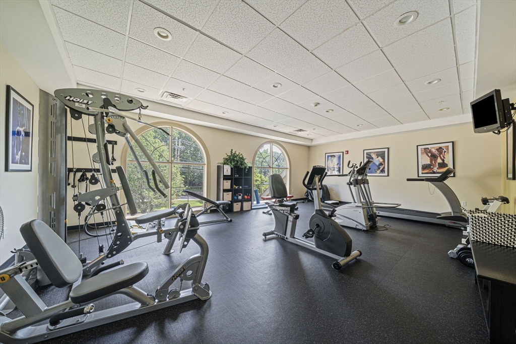 59 Walpole Street, Unit 210 Canton, MA 02021 - Photo 30 of 42 a view of a room with gym equipment