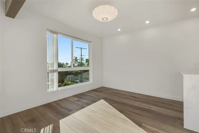 a view of a palm tree from a balcony