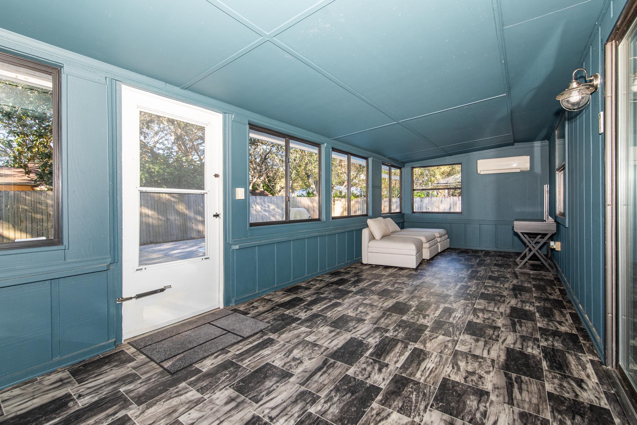 140 Orchis Road St. Augustine, FL 32086 - Photo 12 of 41 a living room with a large window