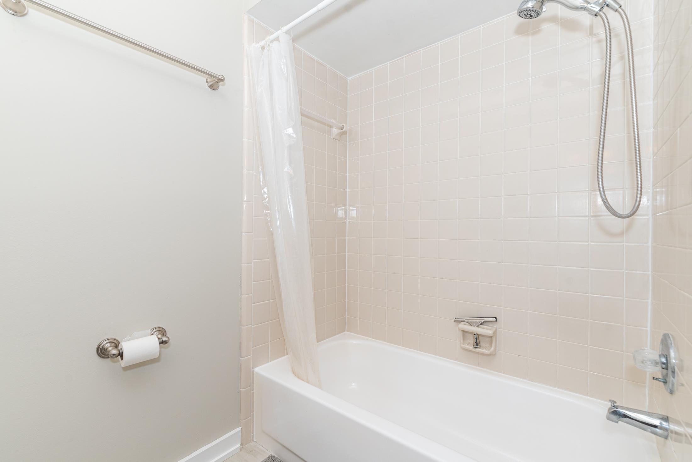 140 Orchis Road St. Augustine, FL 32086 - Photo 26 of 41 a white bath tub sitting next to a white sink and a shower