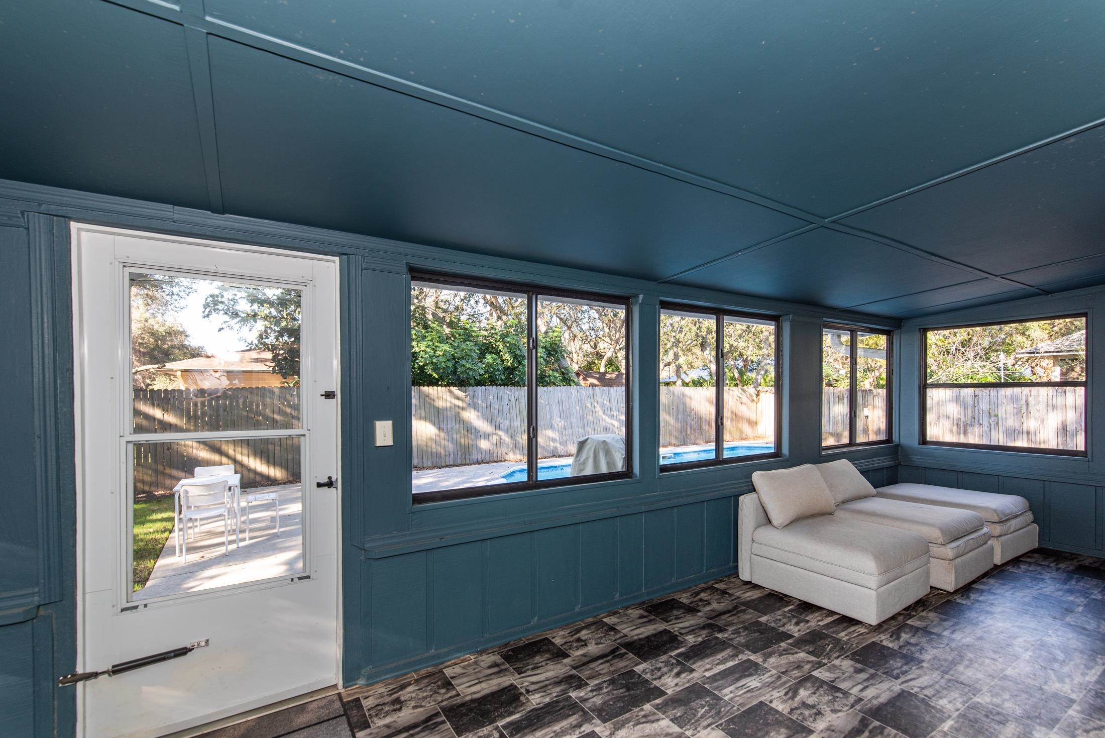 140 Orchis Road St. Augustine, FL 32086 - Photo 34 of 41 a living room with furniture and a large window