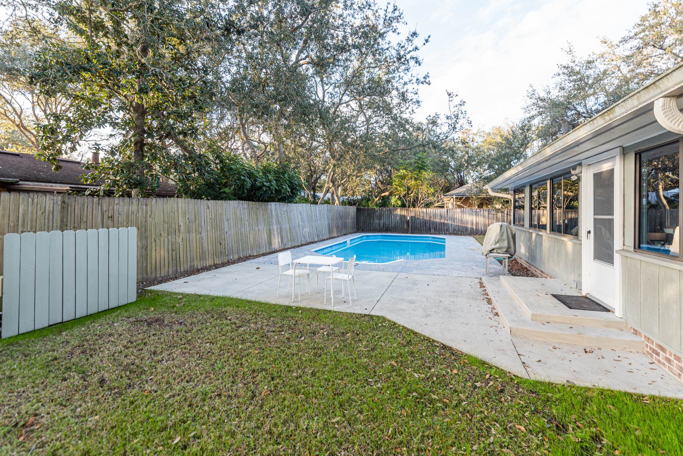 140 Orchis Road St. Augustine, FL 32086 - Photo 37 of 41 a view of a backyard with wooden fence