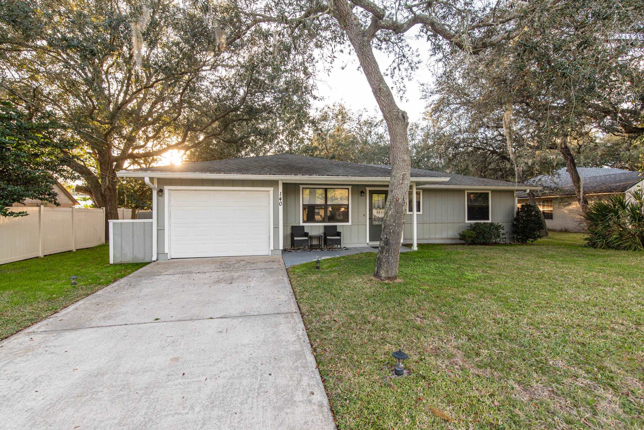 140 Orchis Road St. Augustine, FL 32086 - Photo 41 of 41 front view of a house and a yard