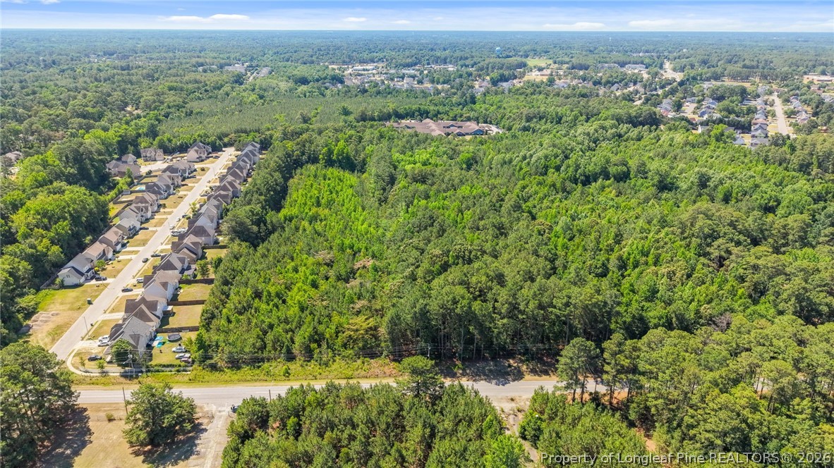 0 Old Bunce Road Fayetteville, NC 28314 - Photo 6 of 8 an aerial view of residential houses with outdoor space and trees