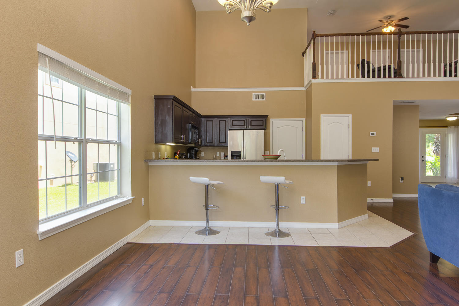 108 Red Maple Court Santa Rosa Beach, FL 32459 - Photo 11 of 30 a view of a kitchen with wooden floor and a window