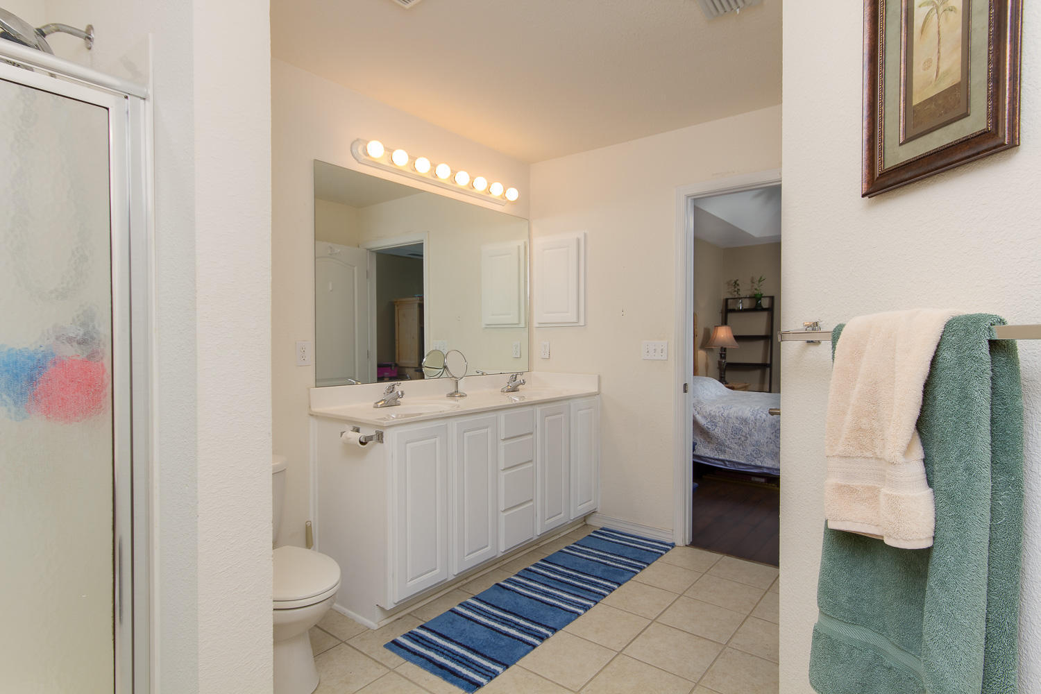 108 Red Maple Court Santa Rosa Beach, FL 32459 - Photo 15 of 30 a bathroom with a sink and a mirror
