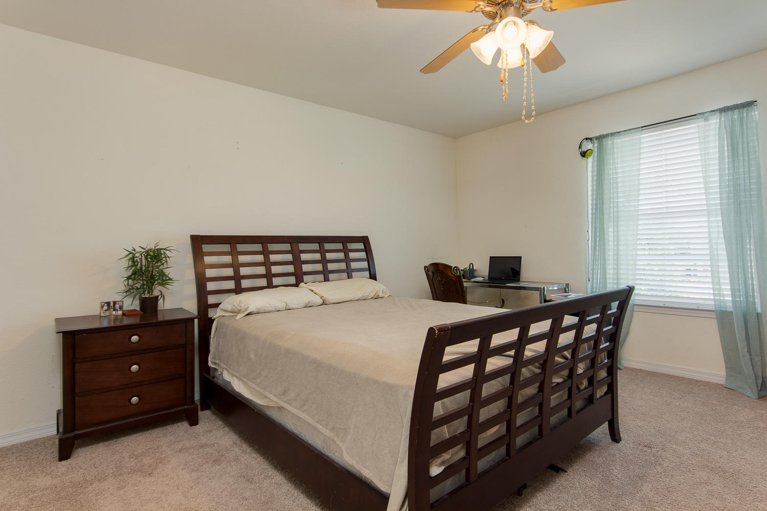 108 Red Maple Court Santa Rosa Beach, FL 32459 - Photo 16 of 30 a bedroom with a bed and a chandelier