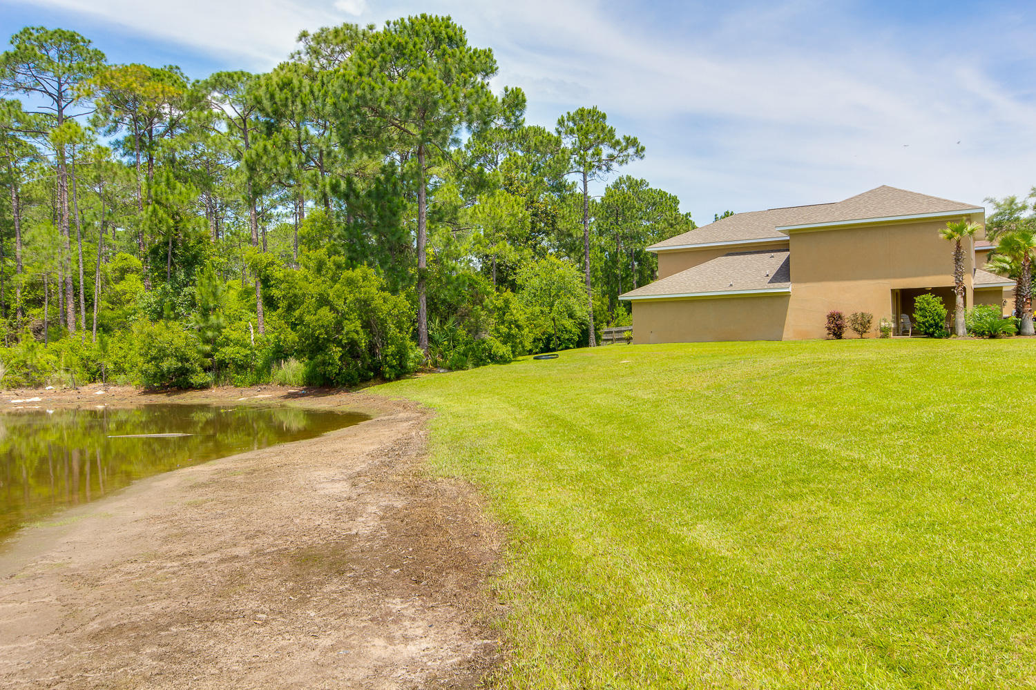 108 Red Maple Court Santa Rosa Beach, FL 32459 - Photo 23 of 30 a view of a house with a swimming pool