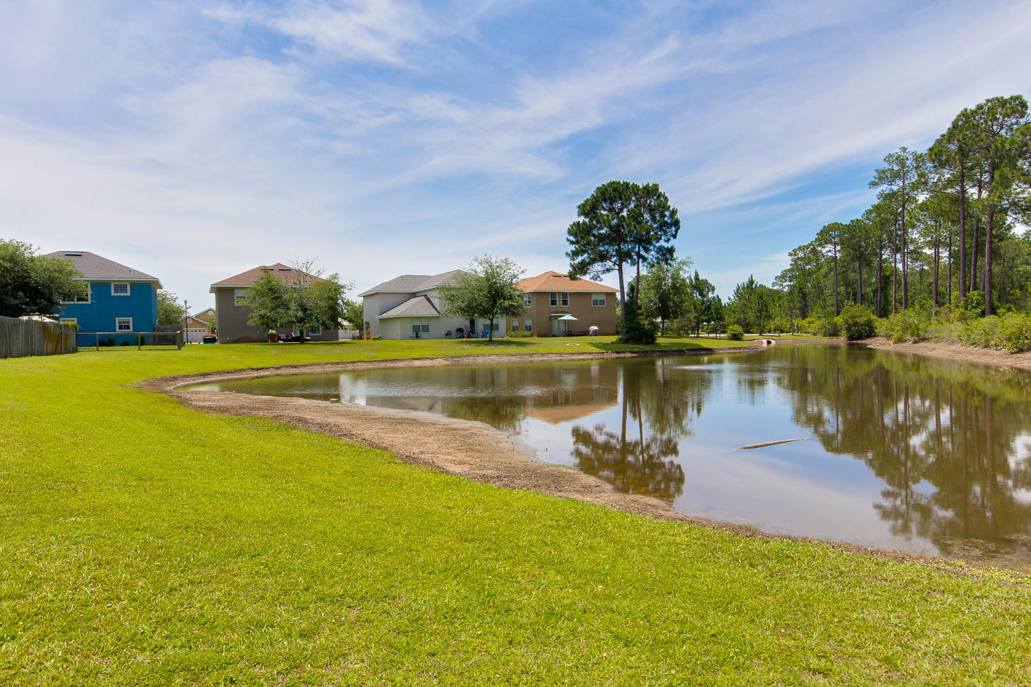 108 Red Maple Court Santa Rosa Beach, FL 32459 - Photo 25 of 30 a view of a lake with houses in the background