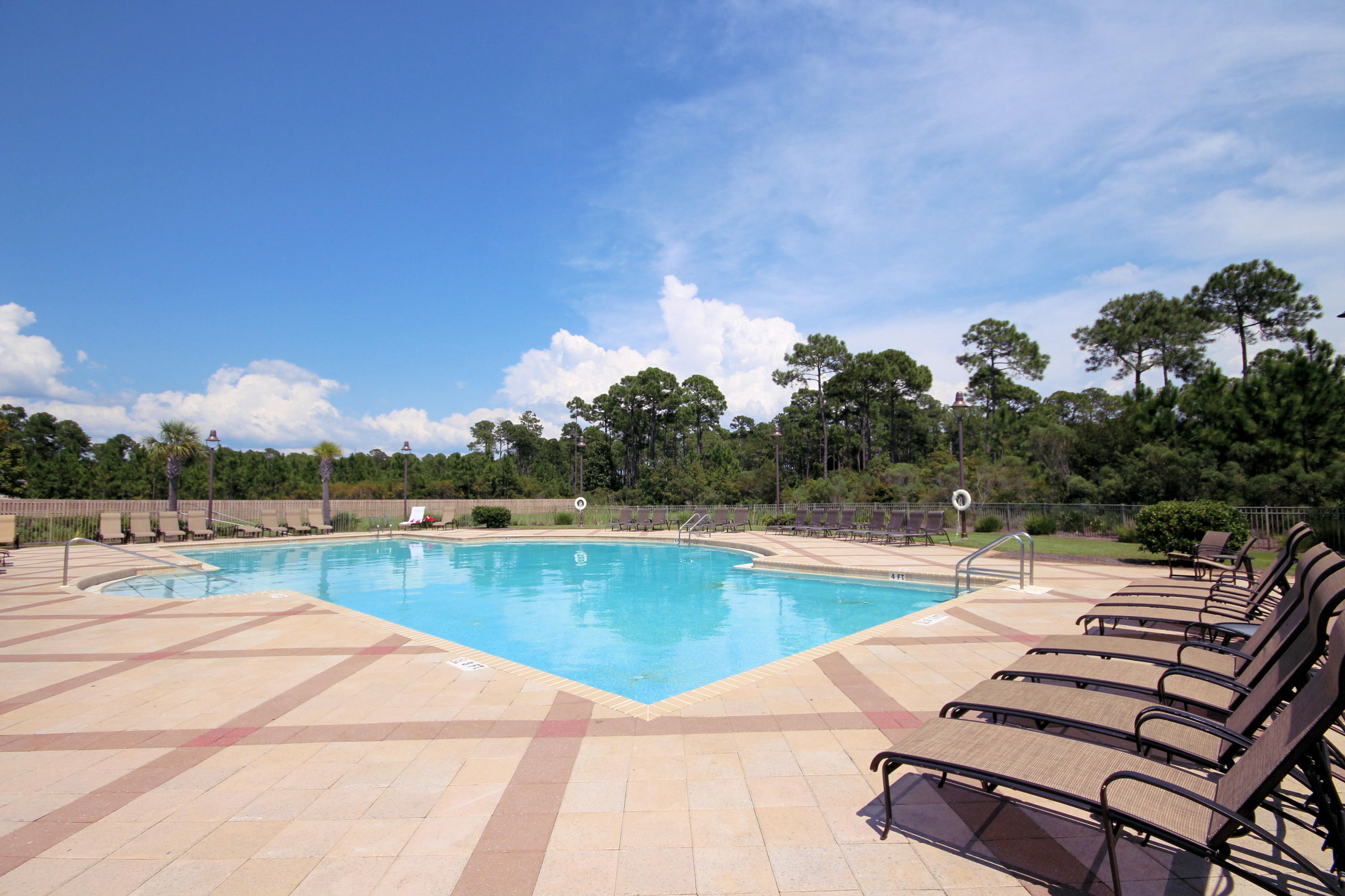 108 Red Maple Court Santa Rosa Beach, FL 32459 - Photo 28 of 30 a view of a swimming pool with lounge chairs