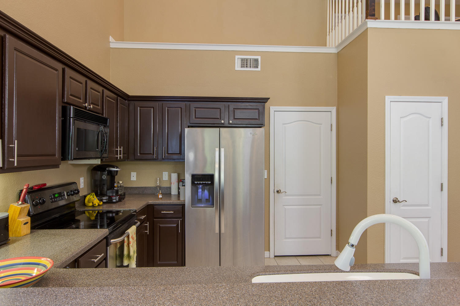 108 Red Maple Court Santa Rosa Beach, FL 32459 - Photo 7 of 30 a kitchen with a refrigerator a stove and a sink