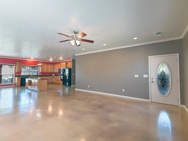 a view of a livingroom with a flat screen tv