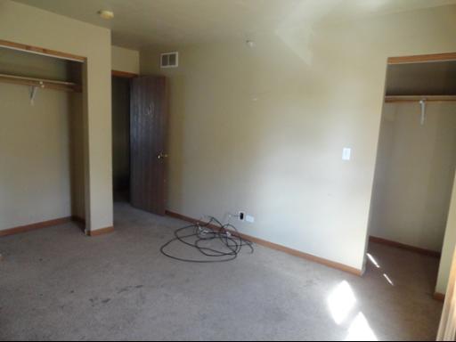 21724 Carol Avenue Sauk Village, IL 60411 - Photo 5 of 10 a view of a room with an empty space and a window