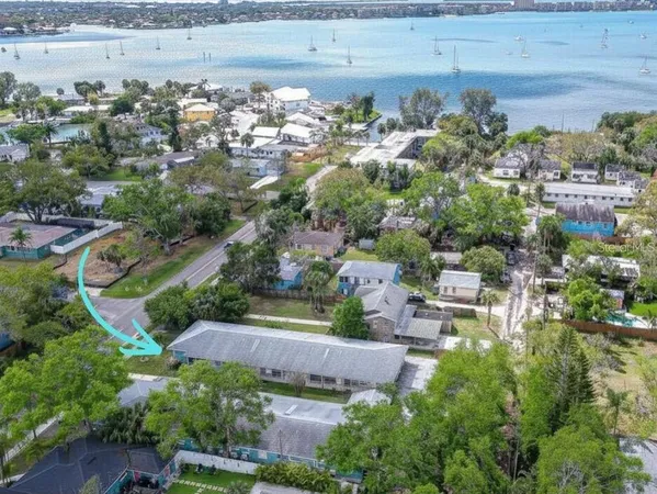 an aerial view of residential house with outdoor space